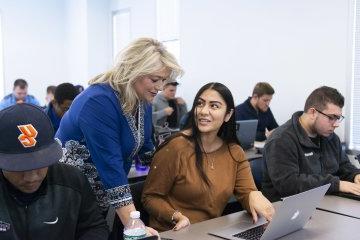 Leslie Corbo and student 0153